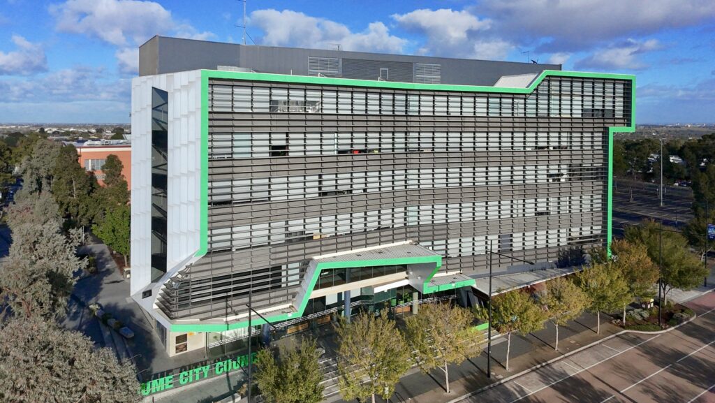 An elevated view showing the relationship between the historic Hawthorn Town Hall and its modern, sculptural stone forecourt, with materials from Eigen Stones.