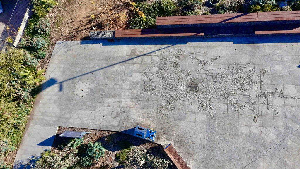 An aerial view of the Werribee Station plaza, showcasing the large, intricate map artwork etched into the stone paving supplied by Eigen Stones.