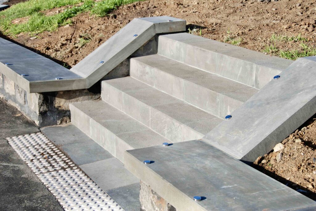 A detailed top-down shot of the intricate, pixelated pattern of the stone setts at Burke Place, supplied by Eigen Stones.