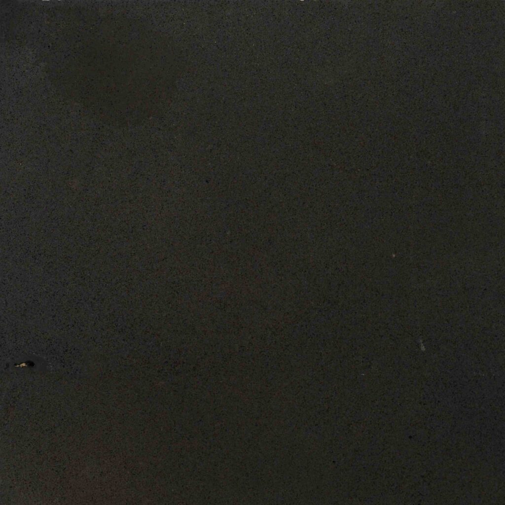 Experience pure, minimalist luxury with Blue Stone Honed pavers. Its flawless, deep charcoal surface creates an atmosphere of absolute sophistication. From Eigen Stones.