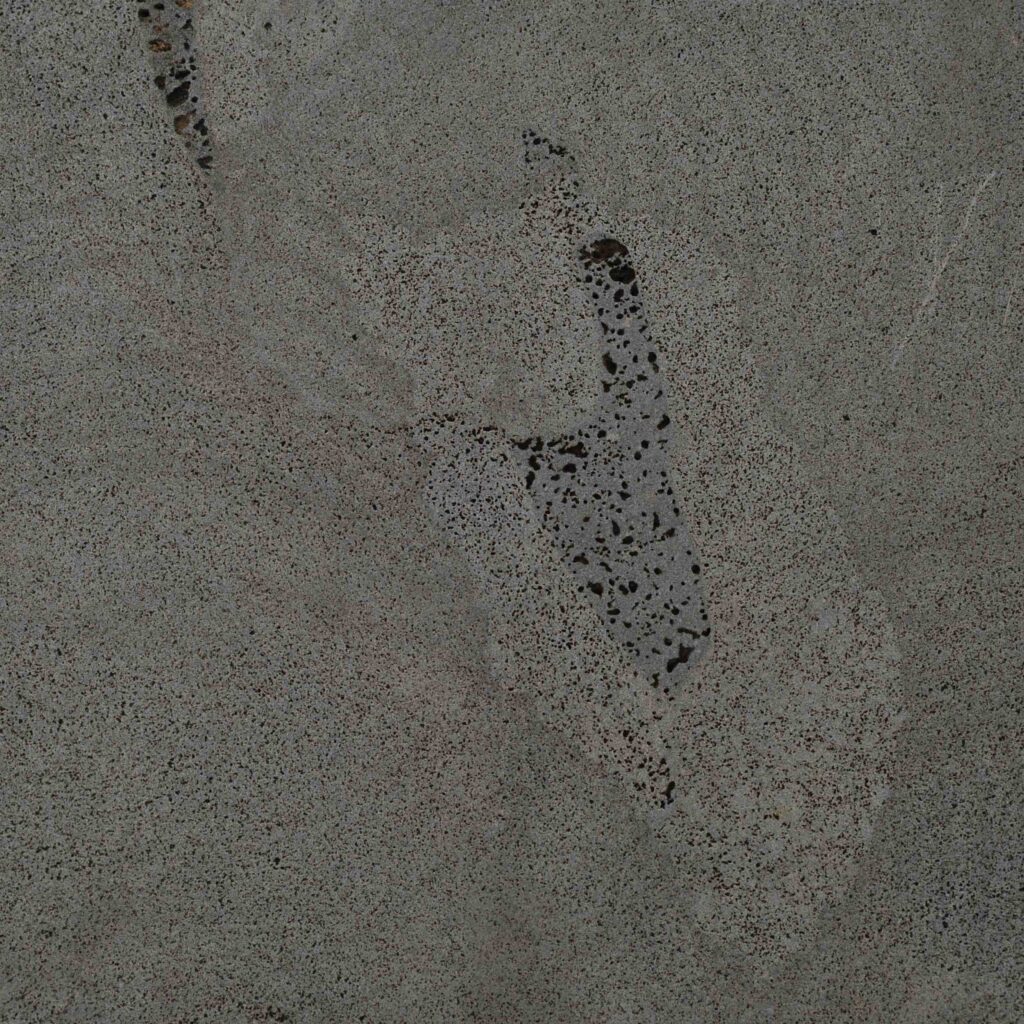 BlueStone_Sawn.jpg: A detailed texture shot of the Blue Stone Sawn paver, showcasing its unique, naturally porous surface with beautiful tonal variations and authentic character.